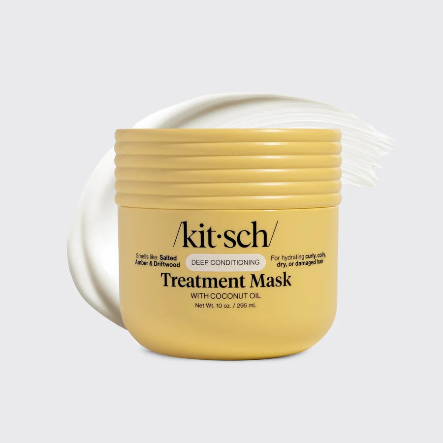 Yellow jar of 'kit-sch' treatment mask on a white background
