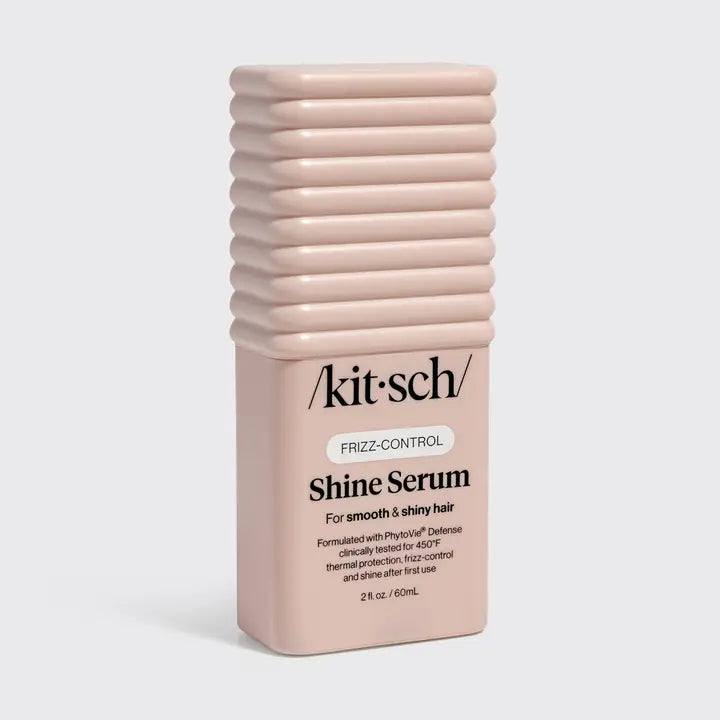 Kit'sch Shine Serum bottle on a light gray background