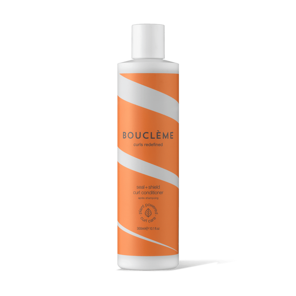 Bouclème Seal + Shield Curl Conditioner for hydrating, smoothing, and protecting wavy, curly, and coily hair.