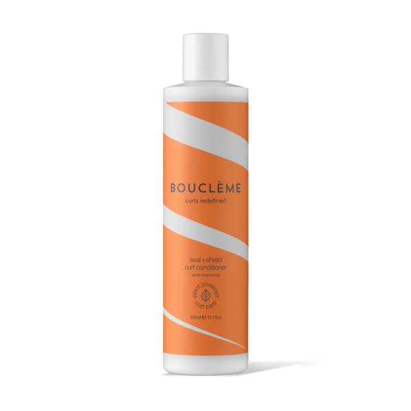 Bouclème Seal + Shield Curl Conditioner for hydrating, smoothing, and protecting wavy, curly, and coily hair.